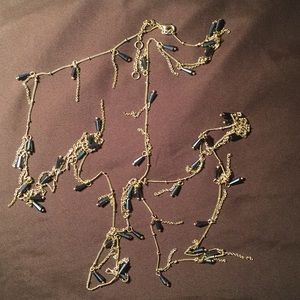 Anthro, long beautiful gold necklace